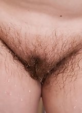 Romana Sweet wants to wash her hairy pussy